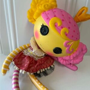 Colorful Button-Eyed Doll with Pink and Yellow Accents